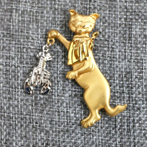 Bronze-y gold with malachite necklace. Cat brooch